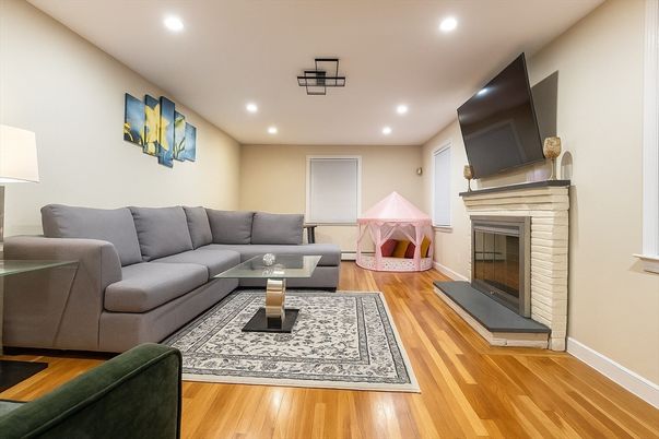 Fireplace, Interior, Living room, Recessed Lighting, Wood Texture Flooring