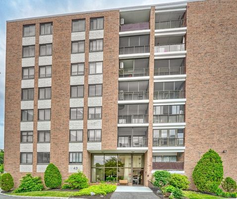 Exterior, Facade, Brick Facade, Condo Building