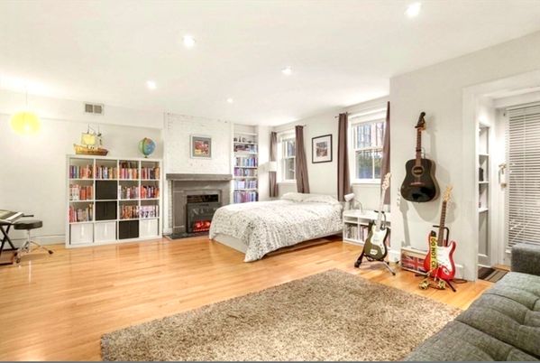 Bedroom, Fireplace, Interior, Pendant Lights, Recessed Lighting, Wood Texture Flooring