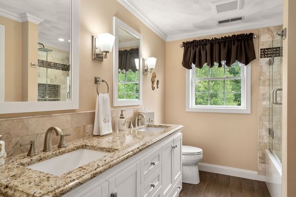 Bathroom, Dual Sink Vanities, Glass Shower, Interior, Recessed Lighting, Wood Texture Flooring