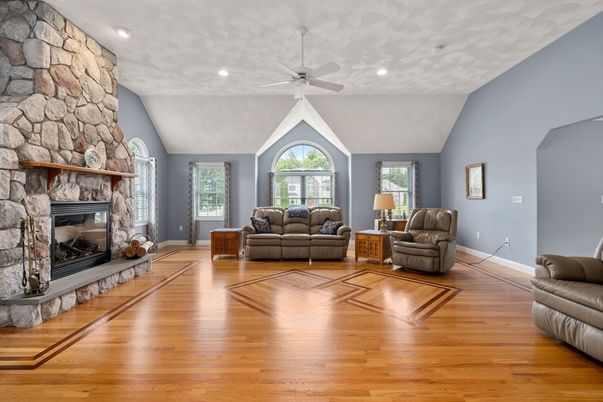 Fireplace, Interior, Living room, Recessed Lighting, Stone Walls, Wood Texture Flooring
