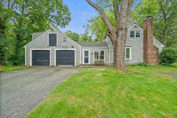 Attached, Backyard, Exterior, Facade, Brick Facade, Cape Cod
