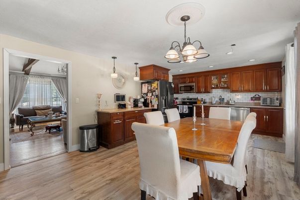 Chandelier, Dining room, Interior, Kitchen, Living room, Pendant Lights, Recessed Lighting, Wood Texture Flooring