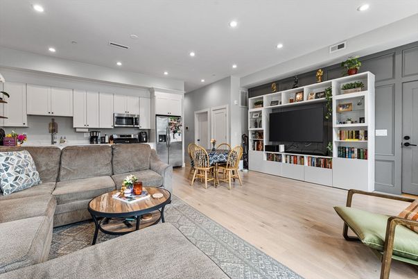 Dining room, Interior, Kitchen, Living room, Recessed Lighting, Stainless Steel Appliances, Wood Texture Flooring
