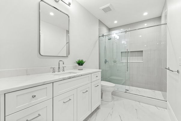 Bathroom, Dual Sink Vanities, Glass Shower, Interior, Marble, Recessed Lighting