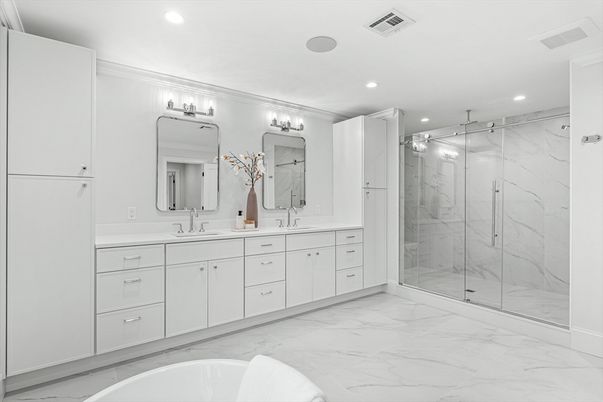 Bathroom, Dual Sink Vanities, Glass Shower, Interior, Marble, Marble Walls, Recessed Lighting
