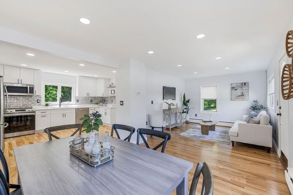 Dining room, Interior, Kitchen, Living room, Recessed Lighting, Stainless Steel Appliances, Wood Texture Flooring