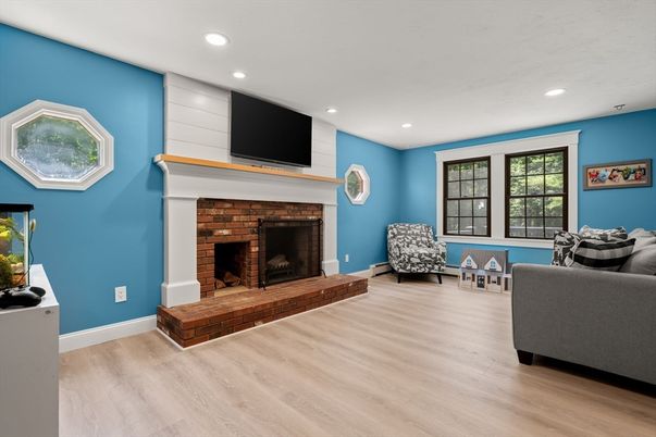 Fireplace, Interior, Living room, Recessed Lighting, Wood Texture Flooring
