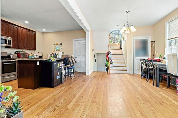 Dining room, Interior, Kitchen, Pendant Lights, Recessed Lighting, Stainless Steel Appliances, Wood Texture Flooring