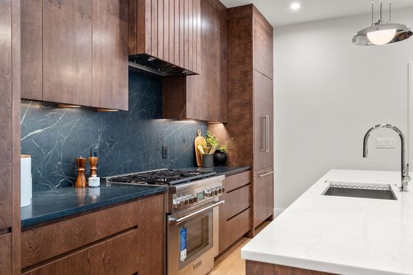 Interior, Kitchen, Marble Walls, Recessed Lighting, Stainless Steel Appliances