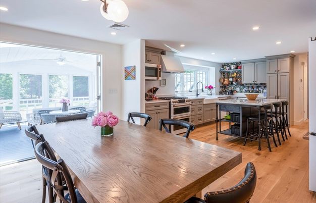 Dining room, Interior, Kitchen, Living room, Recessed Lighting, Stainless Steel Appliances, Wood Texture Flooring