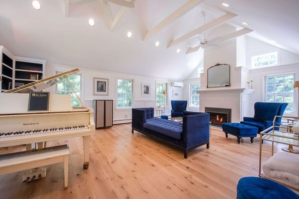 Fireplace, Interior, Living room, Piano, Recessed Lighting, Wood Texture Flooring