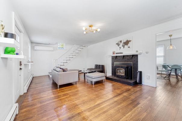 Dining room, Fireplace, Interior, Pendant Lights, Wood Texture Flooring
