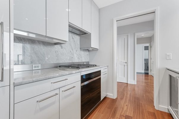 Interior, Kitchen, Marble Walls, Stainless Steel Appliances, Wood Texture Flooring