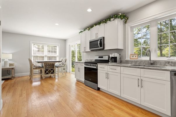Dining room, Interior, Kitchen, Recessed Lighting, Stainless Steel Appliances, Wood Texture Flooring
