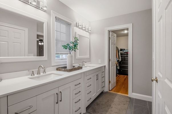 Bathroom, Dual Sink Vanities, Interior, Recessed Lighting, Walk-in Closets, Wood Texture Flooring