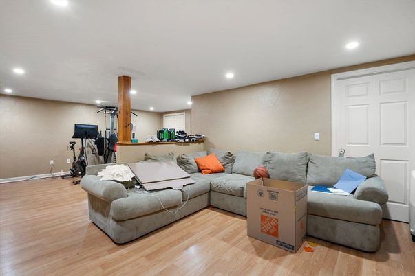 Fitness Equipment, Game Room, Interior, Living room, Recessed Lighting, Wood Texture Flooring