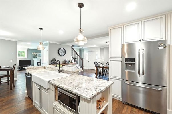 Dining room, Interior, Kitchen, Pendant Lights, Recessed Lighting, Stainless Steel Appliances, Wood Texture Flooring
