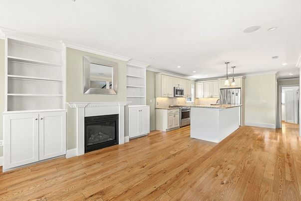 Empty room, Fireplace, Interior, Kitchen, Pendant Lights, Recessed Lighting, Wood Texture Flooring