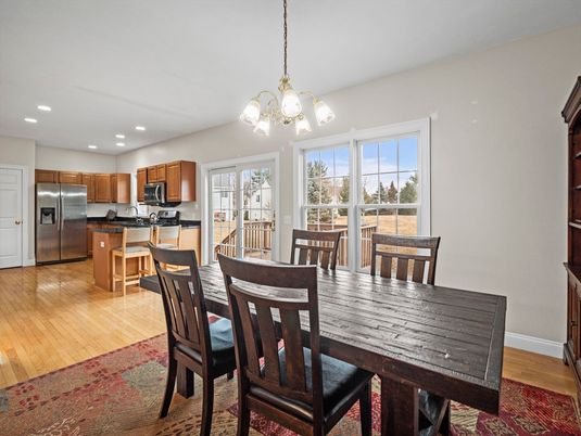 Chandelier, Dining room, Interior, Kitchen, Recessed Lighting, Stainless Steel Appliances, Wood Texture Flooring