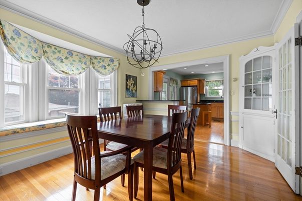 Chandelier, Dining room, Interior, Kitchen, Pendant Lights, Recessed Lighting, Stainless Steel Appliances, Wood Texture Flooring