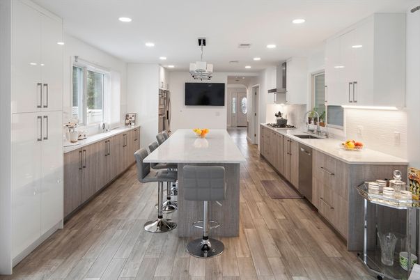 Dining room, Interior, Kitchen, Pendant Lights, Recessed Lighting, Stainless Steel Appliances, Wood Texture Flooring