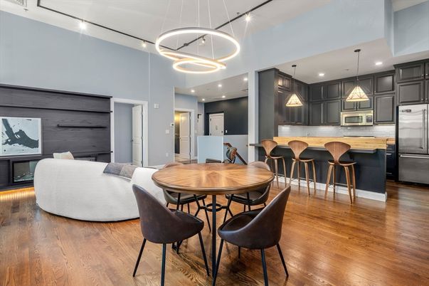 Dining room, Interior, Kitchen, Pendant Lights, Recessed Lighting, Stainless Steel Appliances, Wood Texture Flooring
