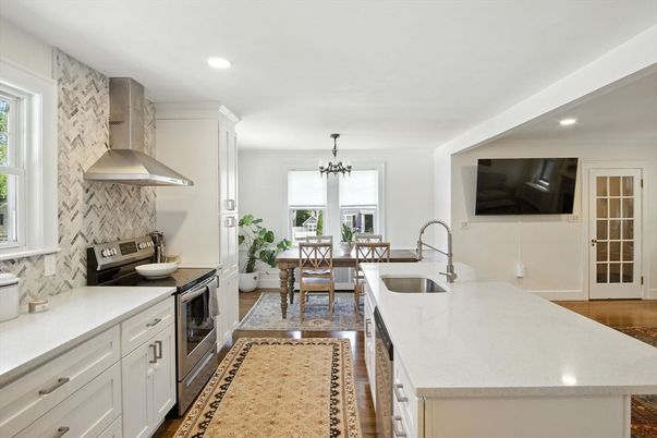 Chandelier, Dining room, Interior, Kitchen, Recessed Lighting, Stainless Steel Appliances, Wood Texture Flooring