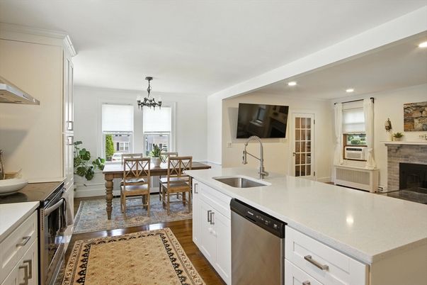 Chandelier, Dining room, Fireplace, Interior, Kitchen, Recessed Lighting, Wood Texture Flooring