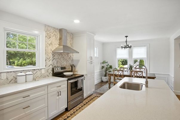 Dining room, Interior, Kitchen, Pendant Lights, Recessed Lighting, Stainless Steel Appliances, Wood Texture Flooring