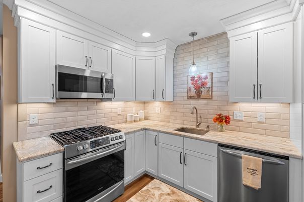 Interior, Kitchen, Pendant Lights, Recessed Lighting, Stainless Steel Appliances, Stone Walls, Wood Texture Flooring