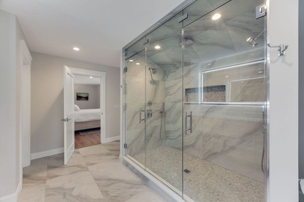 Bathroom, Glass Shower, Interior, Marble, Marble Walls, Recessed Lighting, Wood Texture Flooring