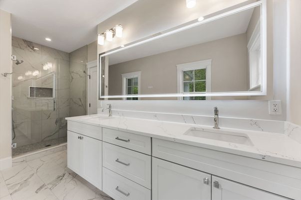 Bathroom, Dual Sink Vanities, Glass Shower, Interior, Marble, Marble Walls, Recessed Lighting
