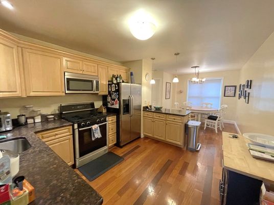 Chandelier, Dining room, Interior, Kitchen, Pendant Lights, Stainless Steel Appliances, Wood Texture Flooring