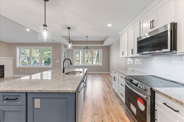 Fireplace, Interior, Kitchen, Pendant Lights, Recessed Lighting, Stainless Steel Appliances, Wood Texture Flooring