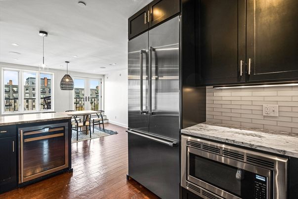 Dining room, Interior, Kitchen, Pendant Lights, Recessed Lighting, Stainless Steel Appliances, Wood Texture Flooring