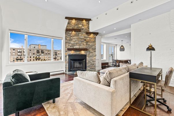 Dining room, Fireplace, Interior, Living room, Pendant Lights, Recessed Lighting, Stone Walls, Wood Texture Flooring