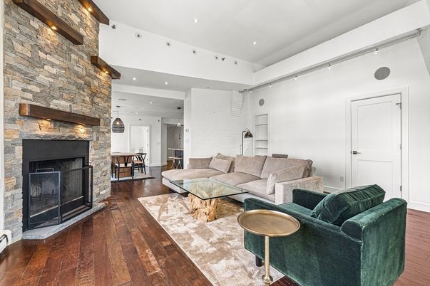 Dining room, Fireplace, Interior, Living room, Pendant Lights, Recessed Lighting, Stone Walls, Wood Texture Flooring