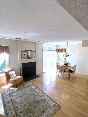 Chandelier, Dining room, Fireplace, Interior, Wood Texture Flooring