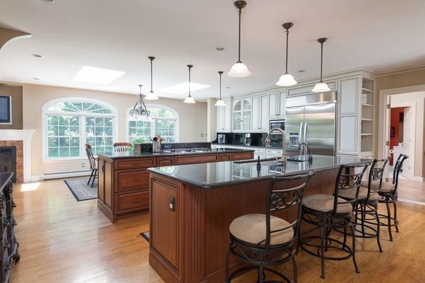Dining room, Fireplace, Interior, Kitchen, Pendant Lights, Recessed Lighting, Stainless Steel Appliances, Wood Texture Flooring