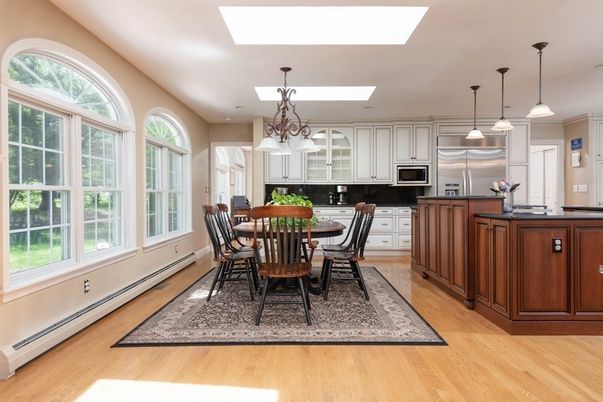 Chandelier, Dining room, Interior, Kitchen, Pendant Lights, Recessed Lighting, Stainless Steel Appliances, Wood Texture Flooring