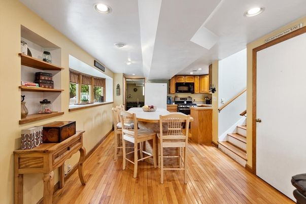 Dining room, Interior, Kitchen, Recessed Lighting, Stainless Steel Appliances, Wood Texture Flooring