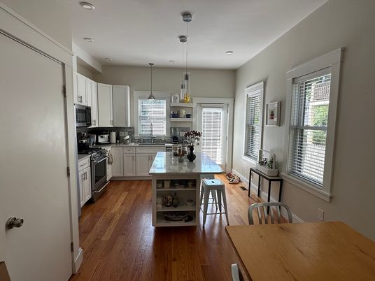 Dining room, Interior, Kitchen, Pendant Lights, Recessed Lighting, Stainless Steel Appliances, Wood Texture Flooring