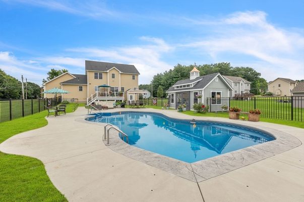 Exterior, Pool, Solar Panels