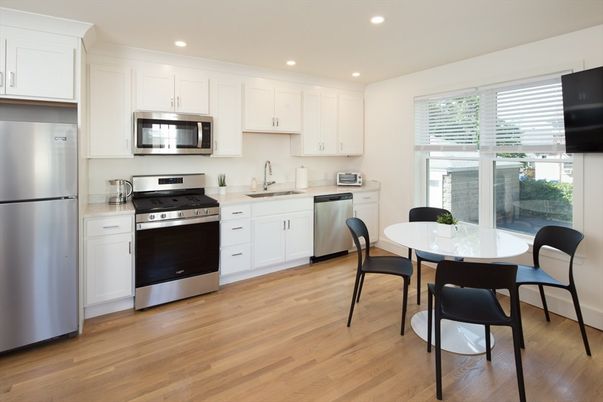 Dining room, Interior, Kitchen, Recessed Lighting, Stainless Steel Appliances, Wood Texture Flooring