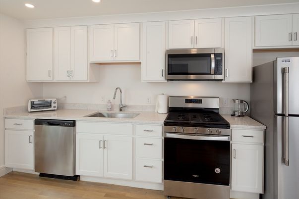 Interior, Kitchen, Recessed Lighting, Stainless Steel Appliances, Wood Texture Flooring
