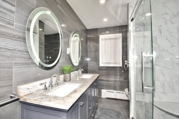 Bathroom, Dual Sink Vanities, Glass Shower, Interior, Marble Walls, Recessed Lighting