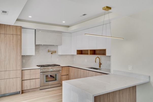 Interior, Kitchen, Marble Walls, Pendant Lights, Recessed Lighting, Stainless Steel Appliances, Wood Texture Flooring