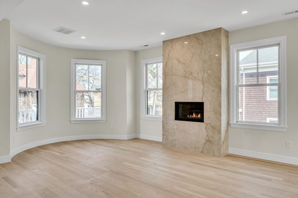 Empty room, Fireplace, Interior, Marble Walls, Recessed Lighting, Wood Texture Flooring