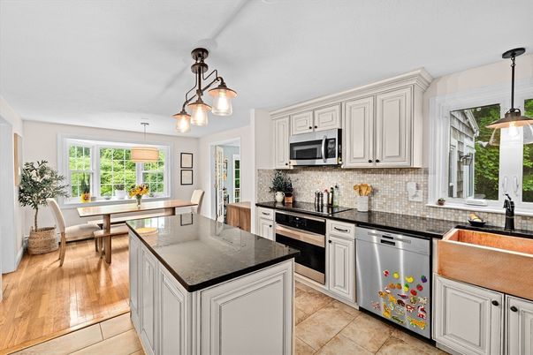 Dining room, Interior, Kitchen, Pendant Lights, Stainless Steel Appliances, Wood Texture Flooring